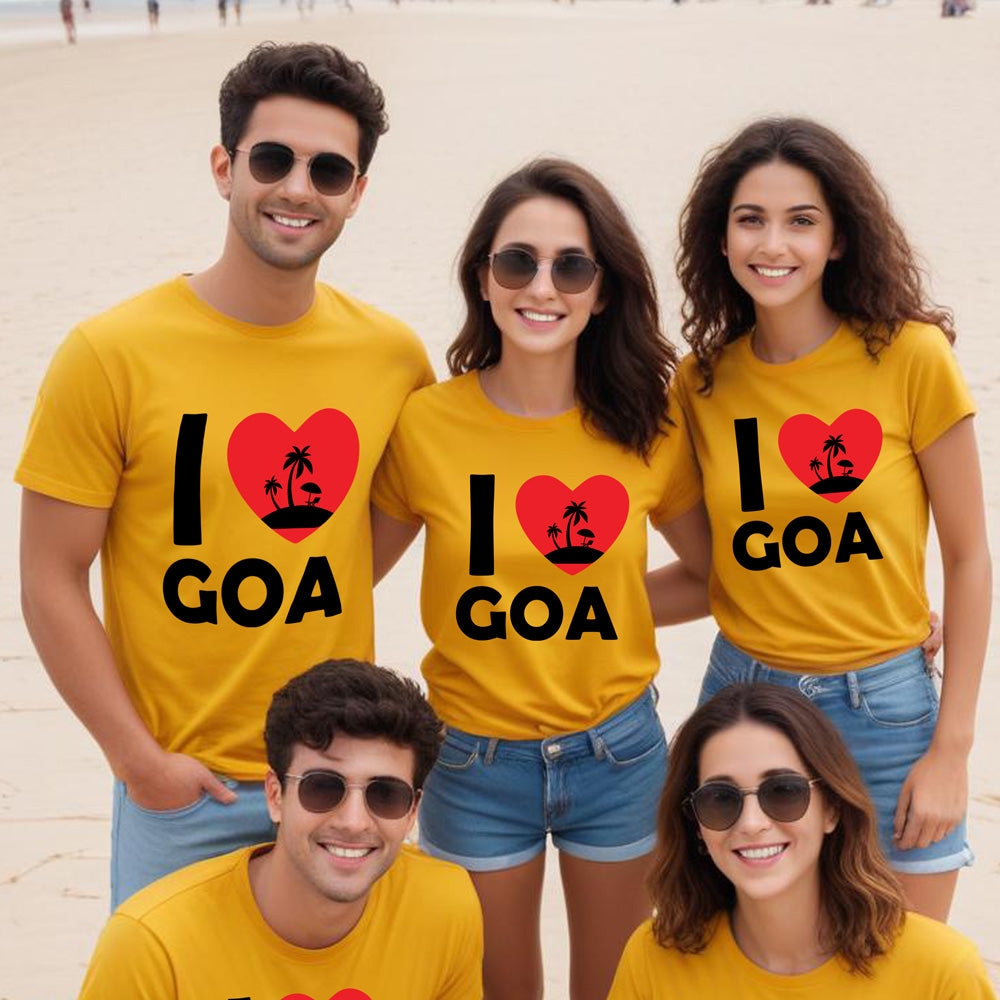 Five friends wearing yellow 'I ❤️ Goa' t-shirts on a beach.