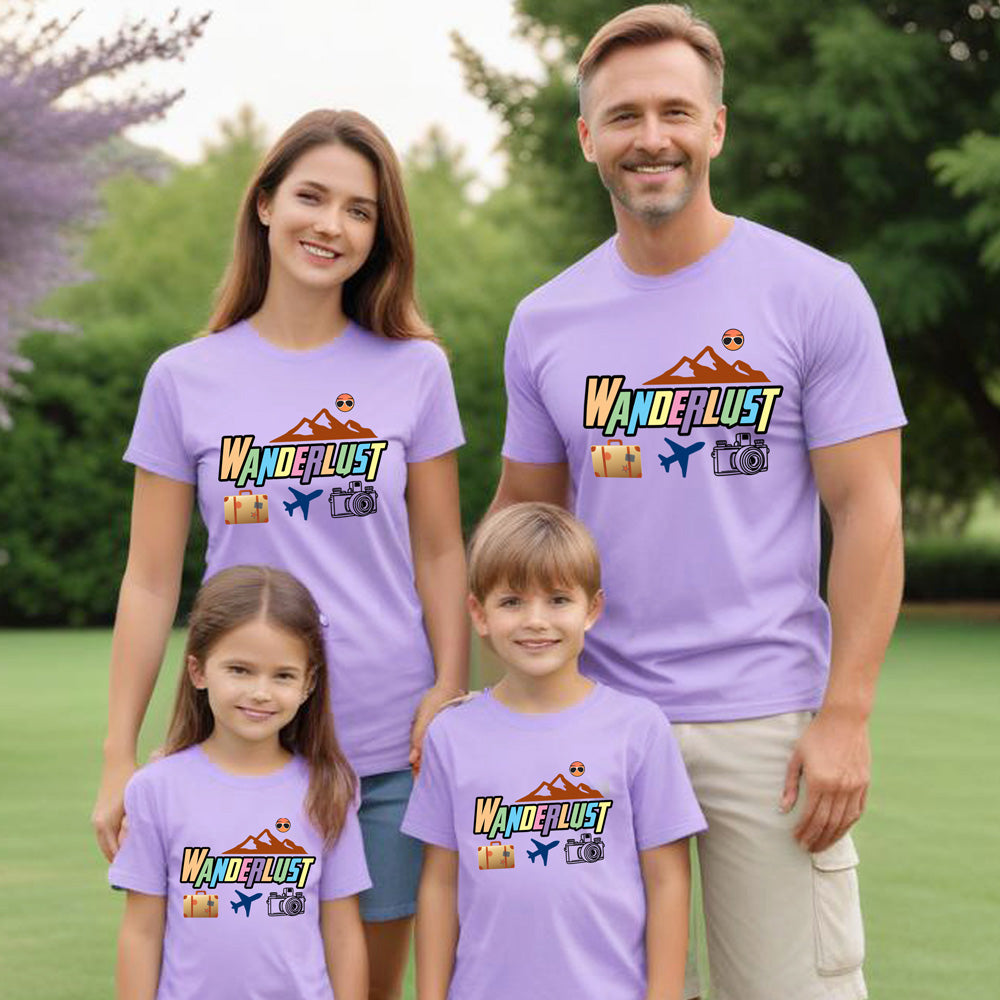 Family of four wearing matching purple t-shirts with 'Wanderlust' design outdoors.