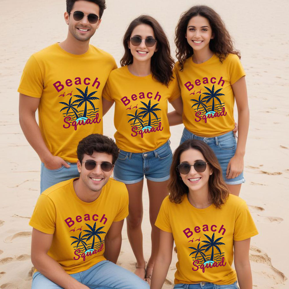Five friends wearing yellow 'Beach Squad' t-shirts on a beach.