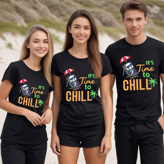 Three people wearing black t-shirts with 'It's Time to Chill' design on a beach.