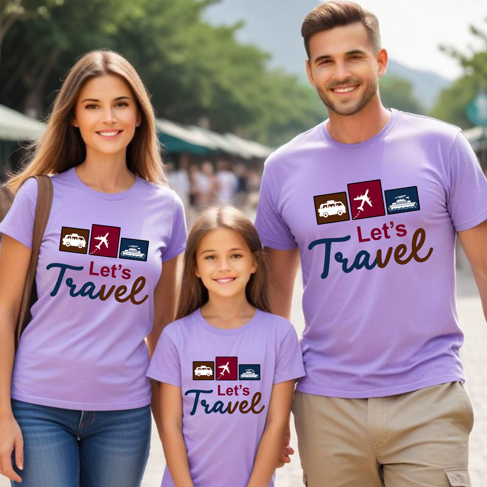 Family of three wearing matching purple t-shirts with 'Let's Travel' design outdoors.