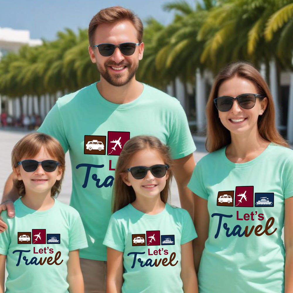 Family of four wearing matching teal t-shirts with 'Let's Travel' design in a tropical setting.