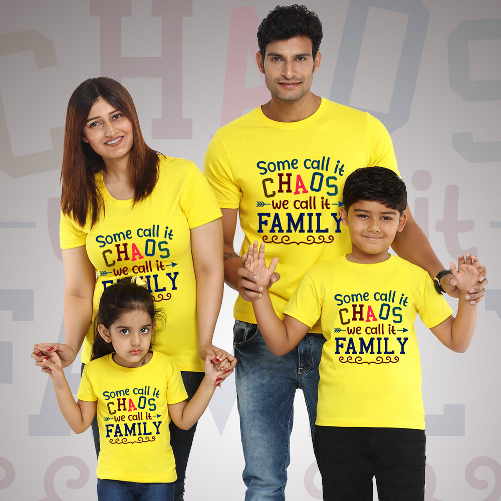 Family of four wearing matching yellow t-shirts with a humorous family quote.