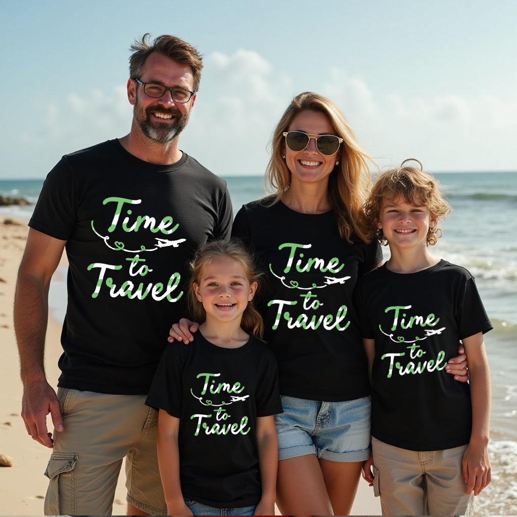 Family of four wearing matching 'Time to Travel' t-shirts on a beach.